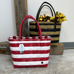 HANDED BY GAMEDAY TOTE