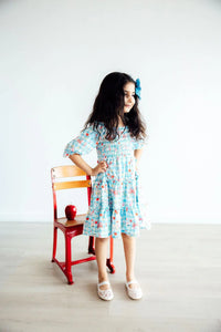HONOR ROLL SMOCKED RUFFLE DRESS