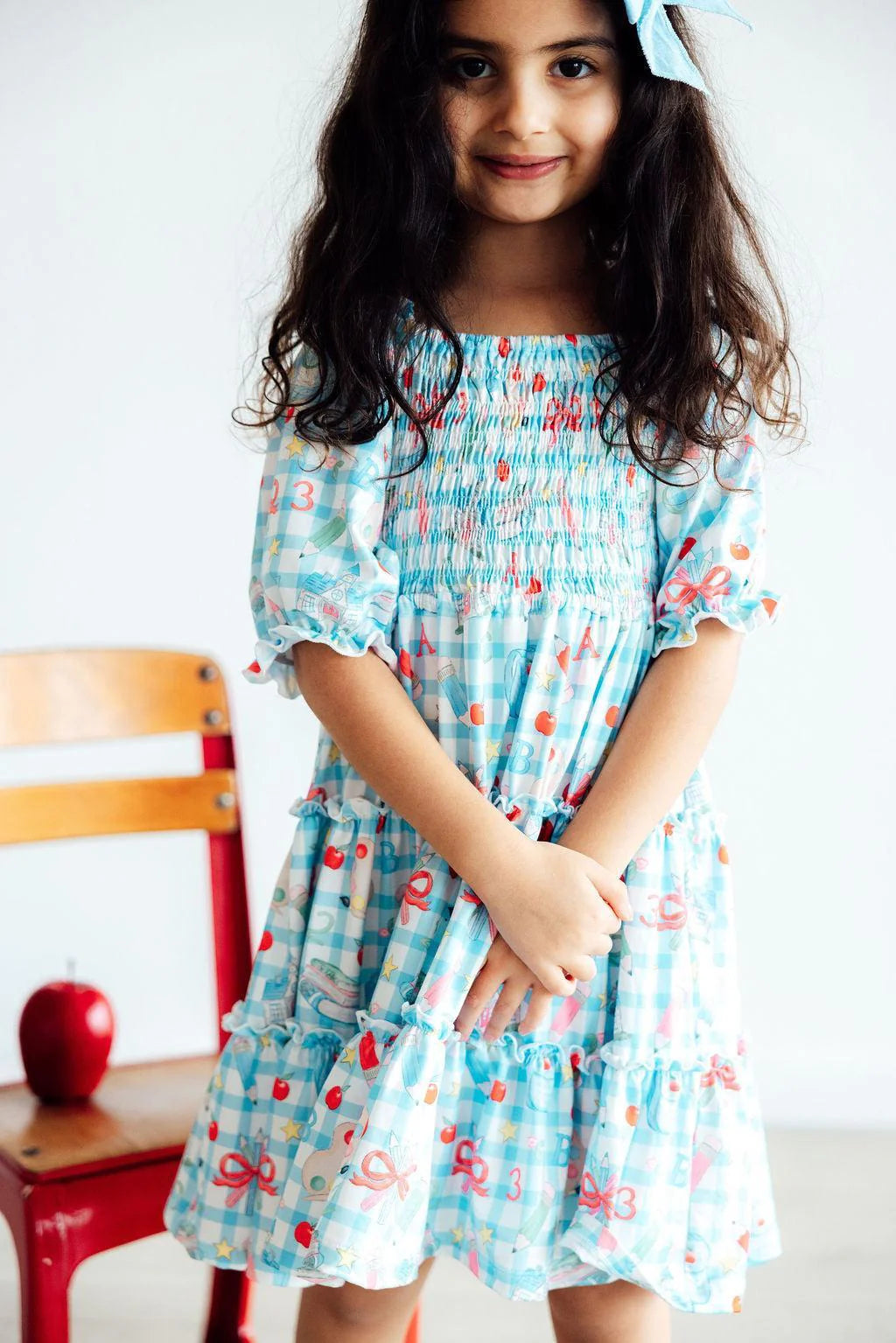 HONOR ROLL SMOCKED RUFFLE DRESS
