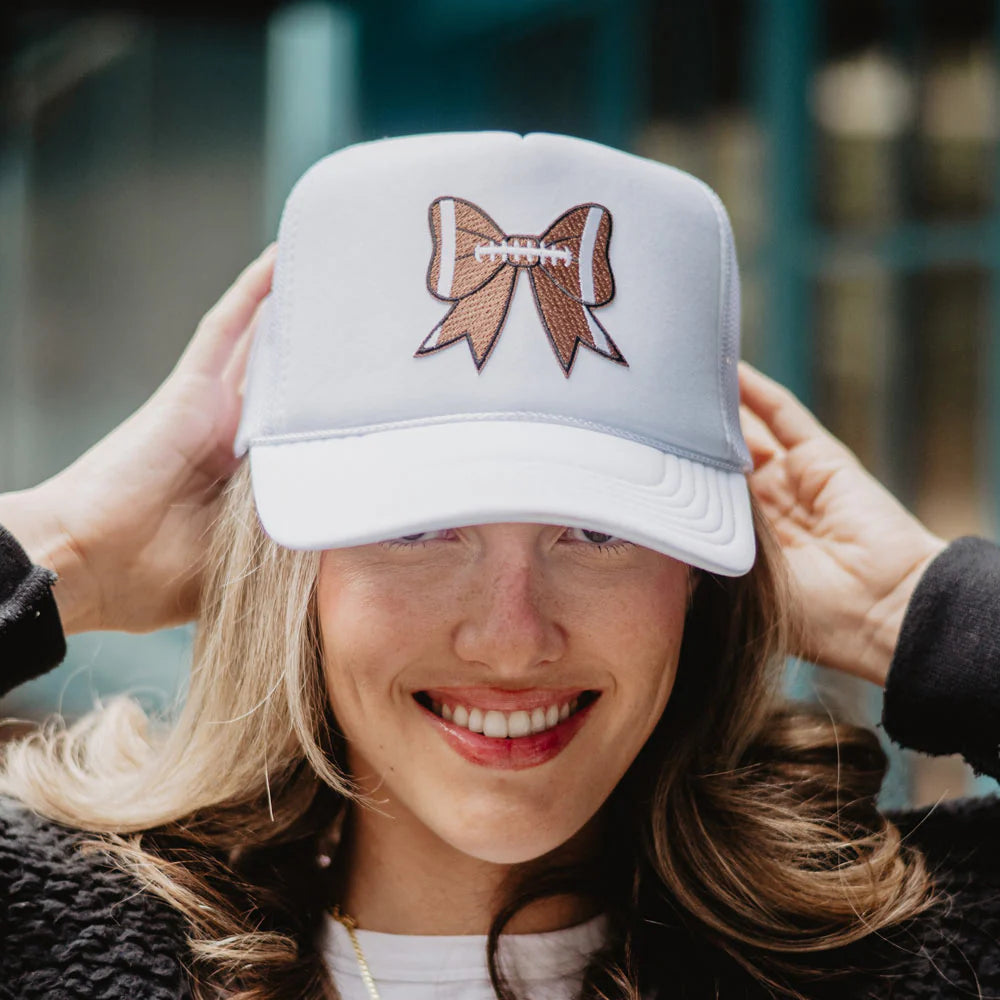 FOOTBALL COQUETTE BOW FOAM TRUCKER HAT